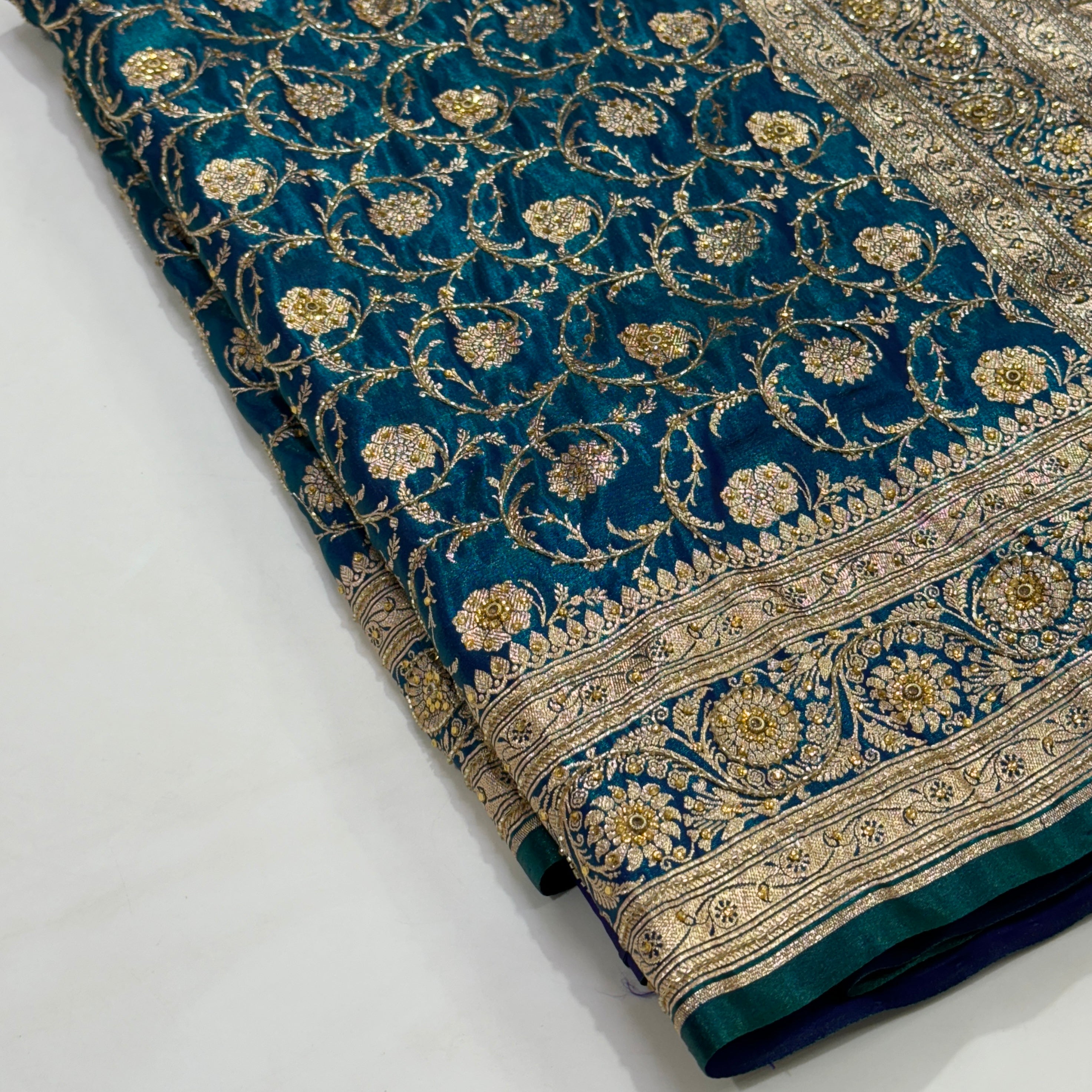 Peacock green Satin Jaal with Ari and Stone