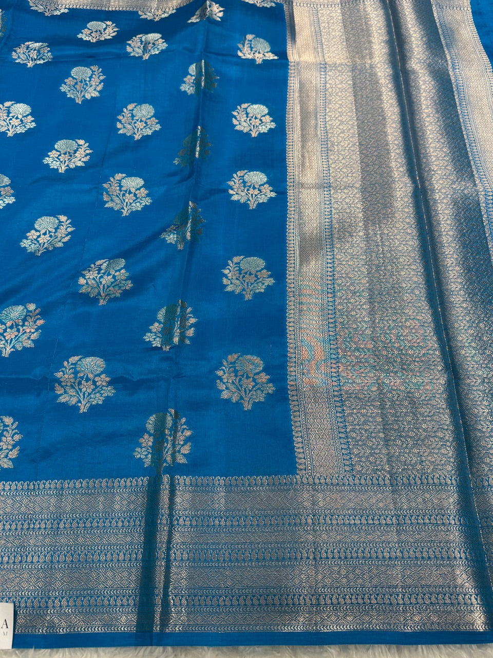 Peacock Blue Flower Booti Pure Caramel Silk Saree
