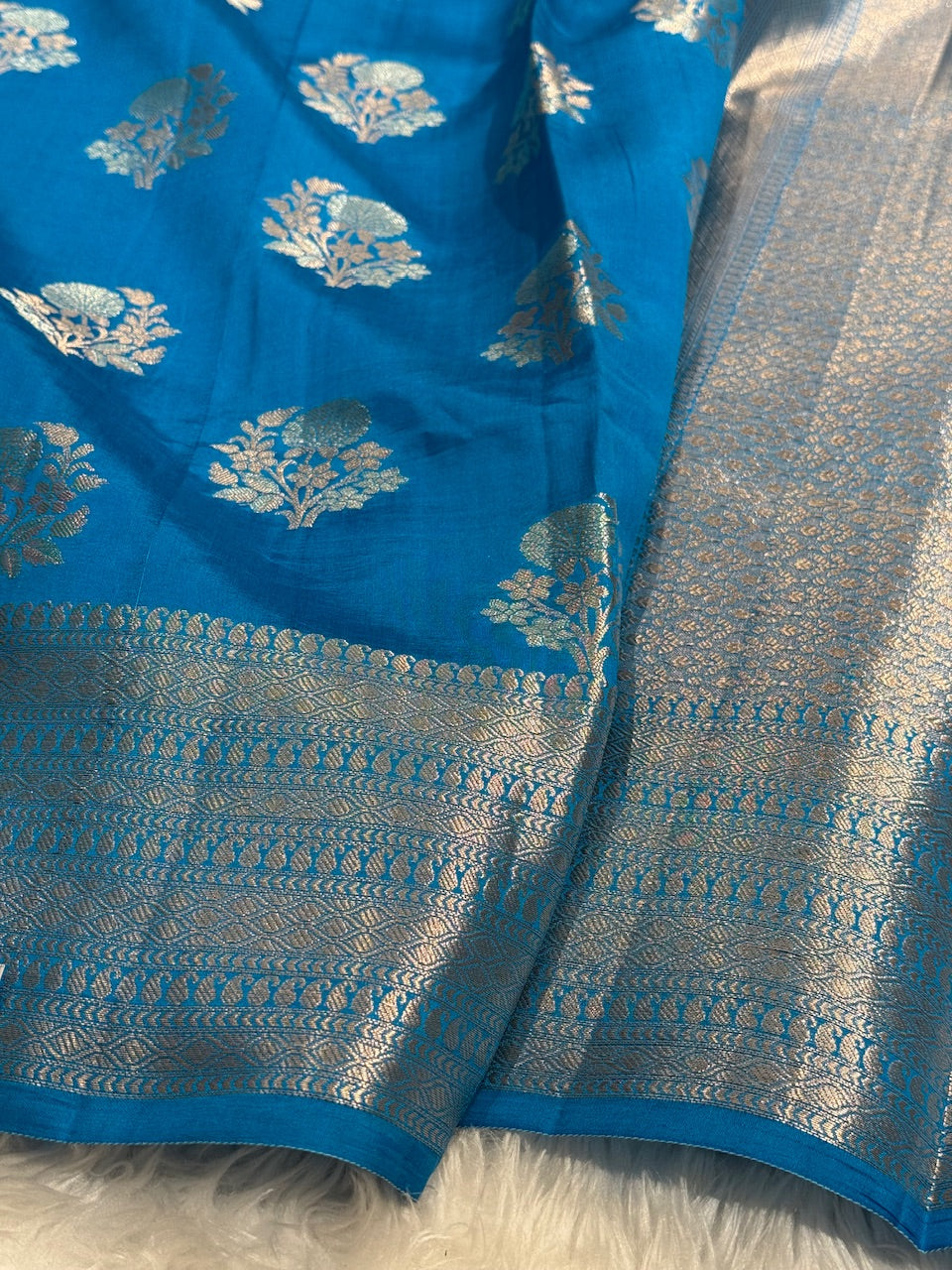 Peacock Blue Flower Booti Pure Caramel Silk Saree