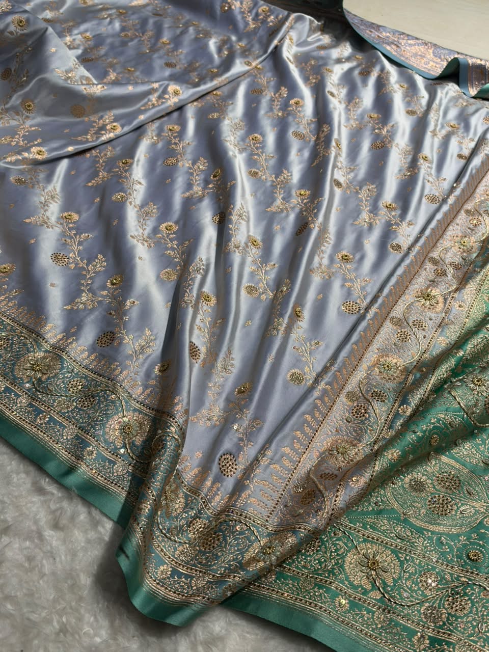 Powder Blue and Teal Green Contrast Banarasi Satin Katan Saree With Aari Zardozi Work Boota in Cross Powder Blue Shades BSK157