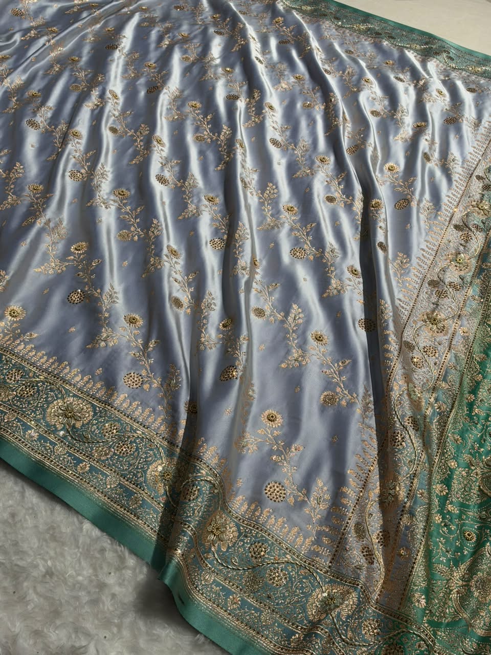 Powder Blue and Teal Green Contrast Banarasi Satin Katan Saree With Aari Zardozi Work Boota in Cross Powder Blue Shades BSK157