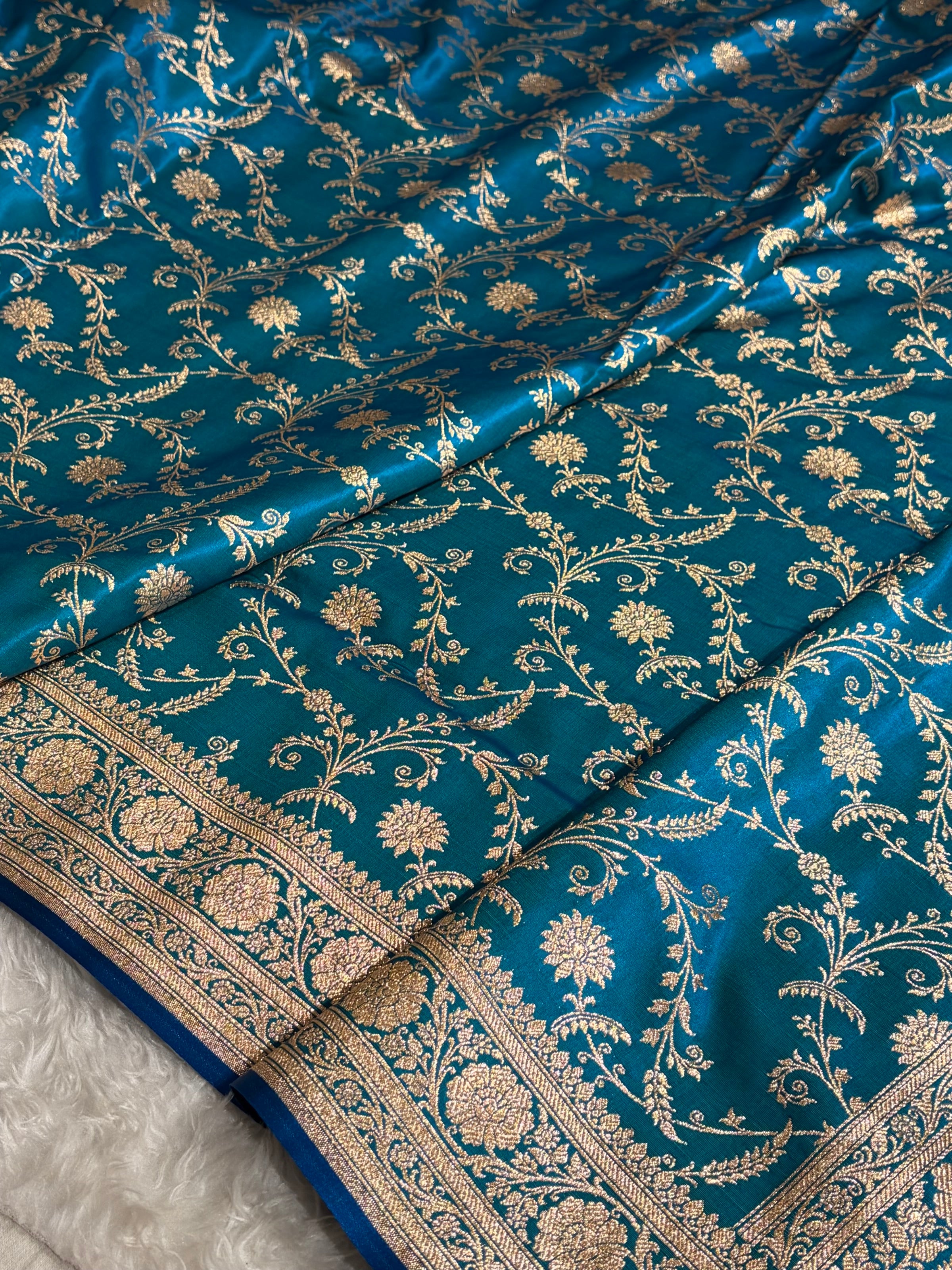 Satin Silk Unique Jaal Pattern In Peacock Shades