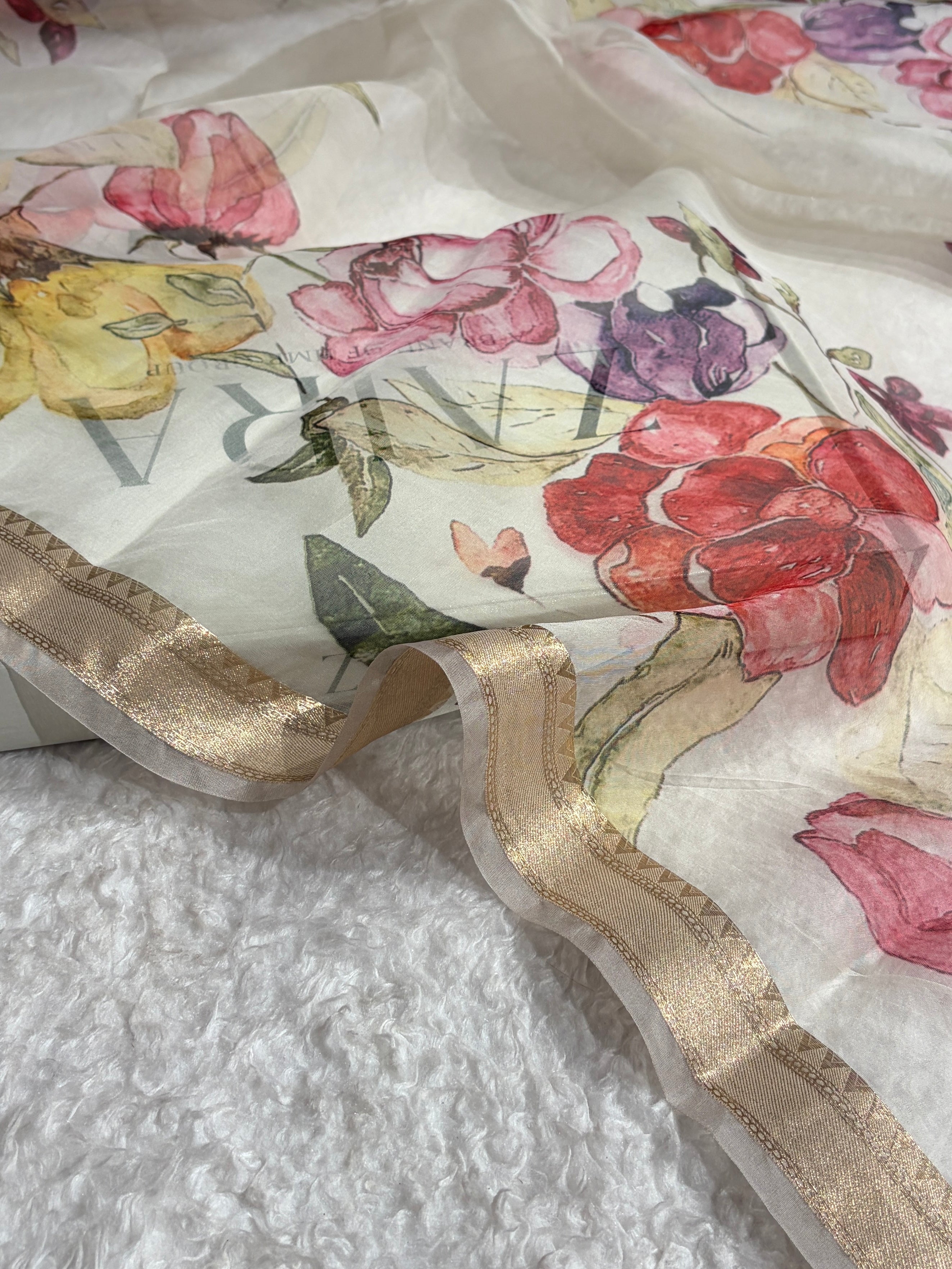 Elegant Ivory Organza with Pastel Multicolor Florals & Gold Zari Border POP01