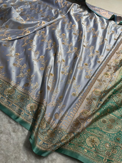 Powder Blue and Teal Green Contrast Banarasi Satin Katan Saree With Aari Zardozi Work Boota in Cross Powder Blue Shades BSK157